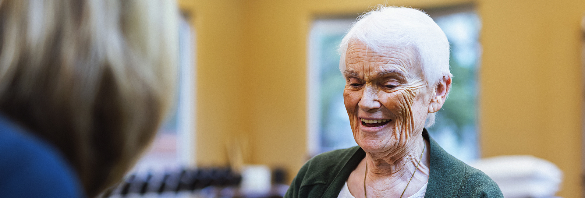 Woman shares her story at Ebenezer Senior Living. 