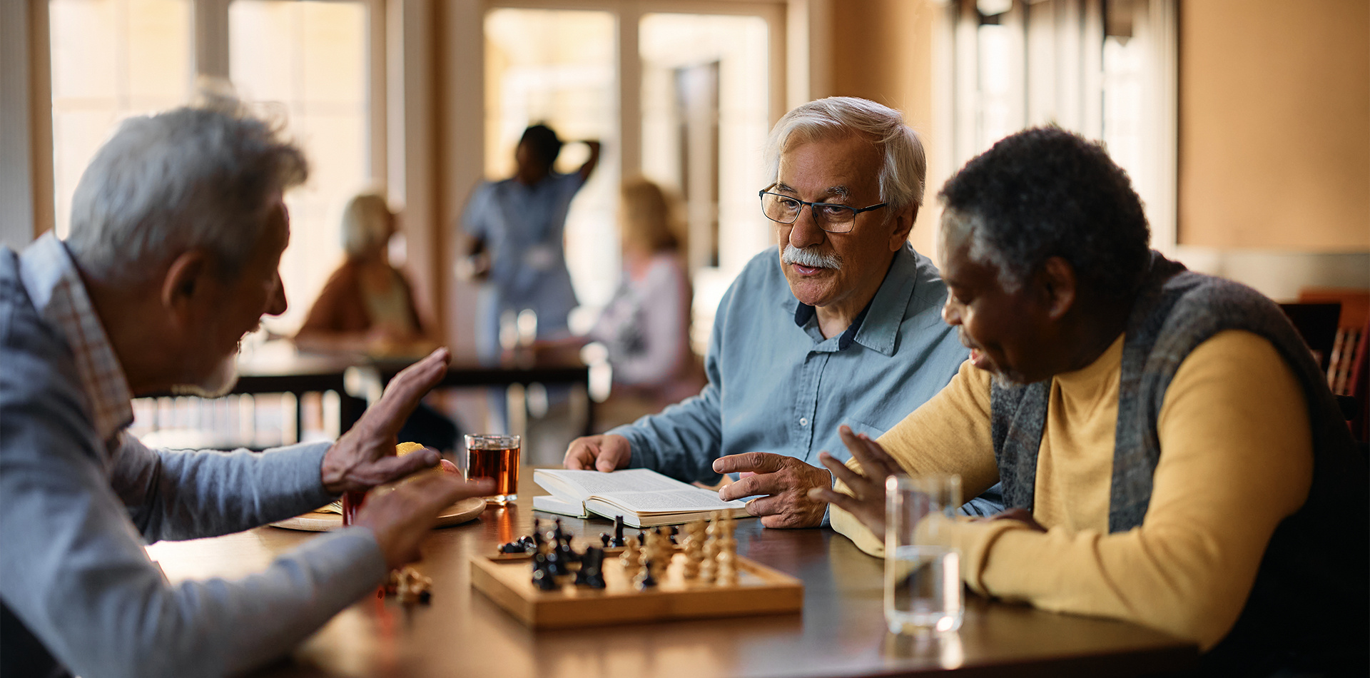 Friends enjoying a game of chess together at Ebenezer Senior Living. 