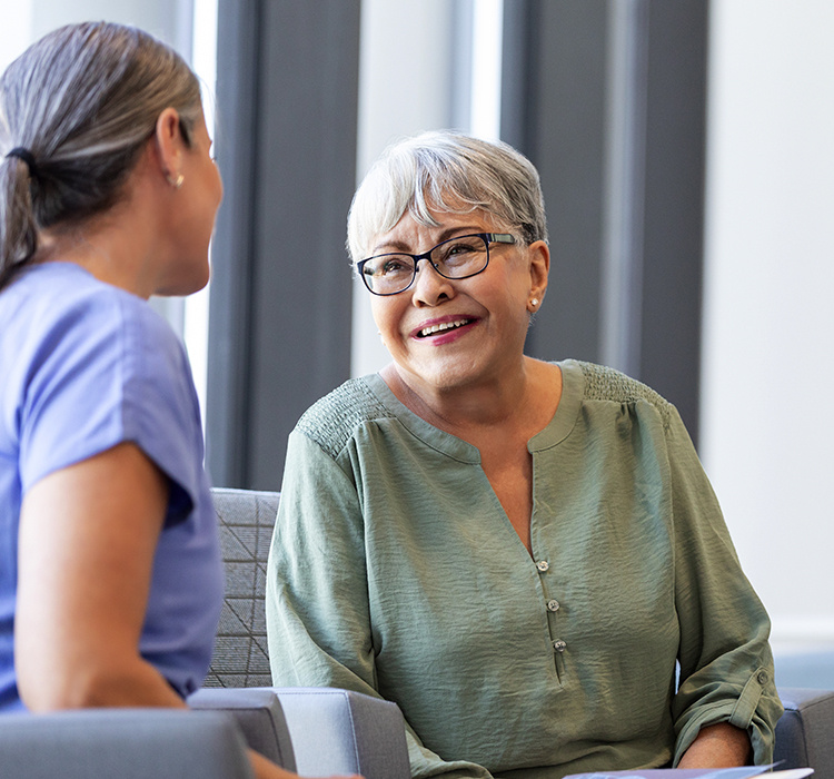 Older woman consulting a doctor. 