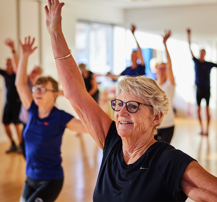 Senior women enjoying a fitness class. 