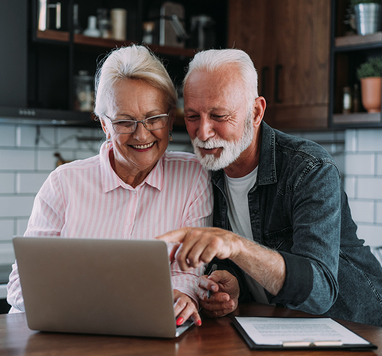 Older couple exploring affordable living options for seniors. 