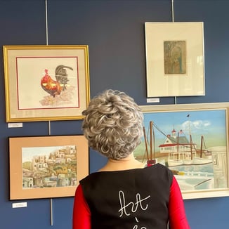 woman looking at art